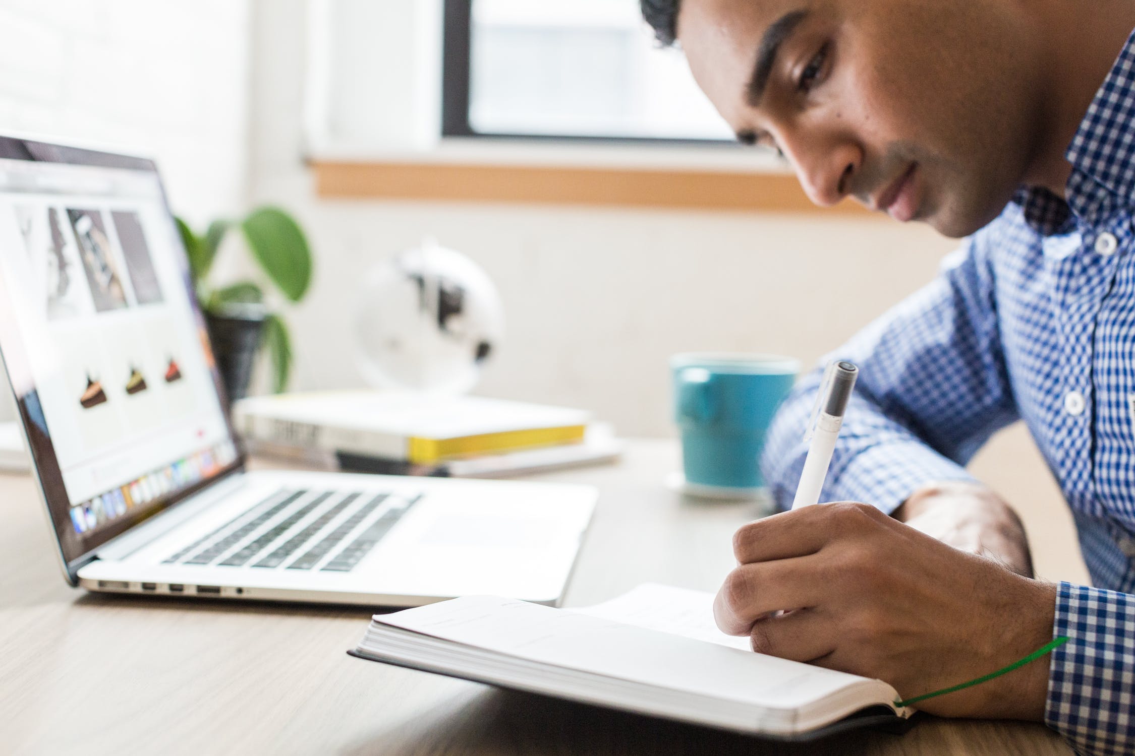 Student sitting at a laptop